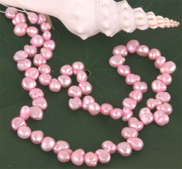 E124 Echter Süßwasser-Perlen-Strang irregular 6-7mm 40cm lang offen rosa